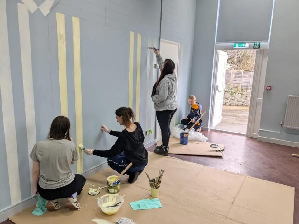 Young people from The King’s Trust helping paint the centre in February 2026.