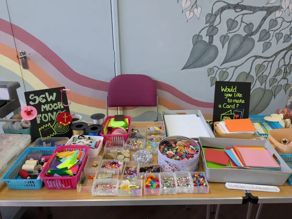 Colourful craft materials laid out ready for the first Cake and Craft afternoon.